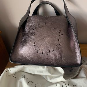 Brand new Stella McCartney bag! Never used. Has pouch and crossbody strap